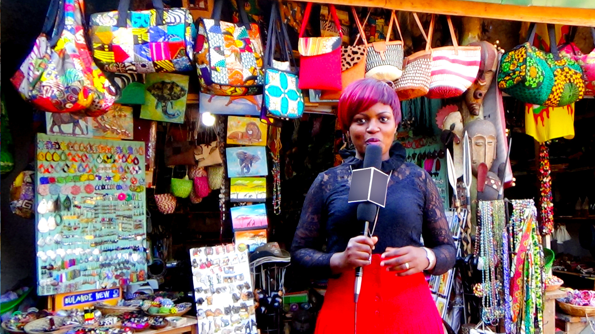 NAWI founder Priscilla Walugyo reporting on women entrepreneurs